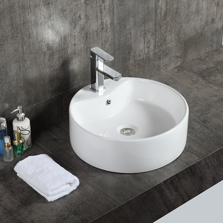 厂家批发简约圆形台上盆陶瓷洗漱盆 椭圆形白艺术盆承接酒店工程